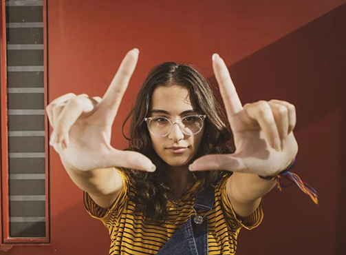 Professional working late at a laptop in a city office